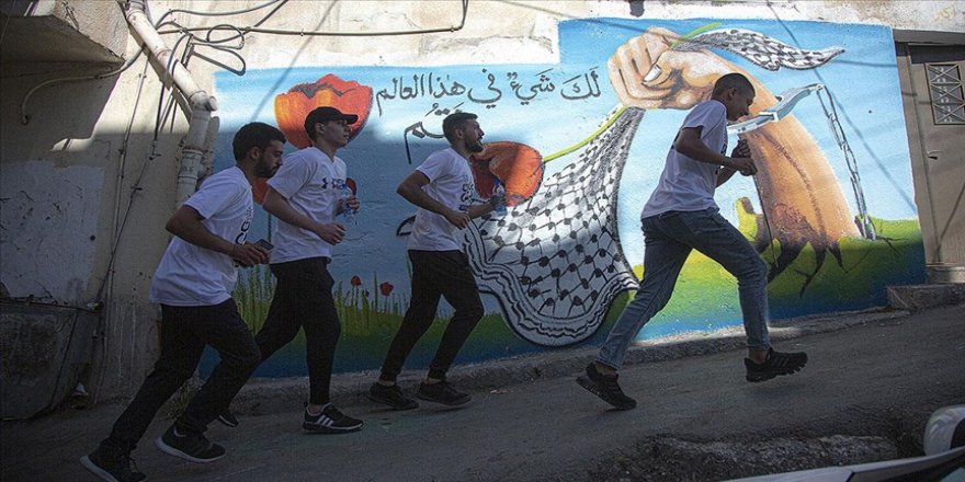 İsrail'in 'zorla yerinden etme' politikasına karşı düzenlenen maratona müdahalesinde 23 Filistinli yaralandı